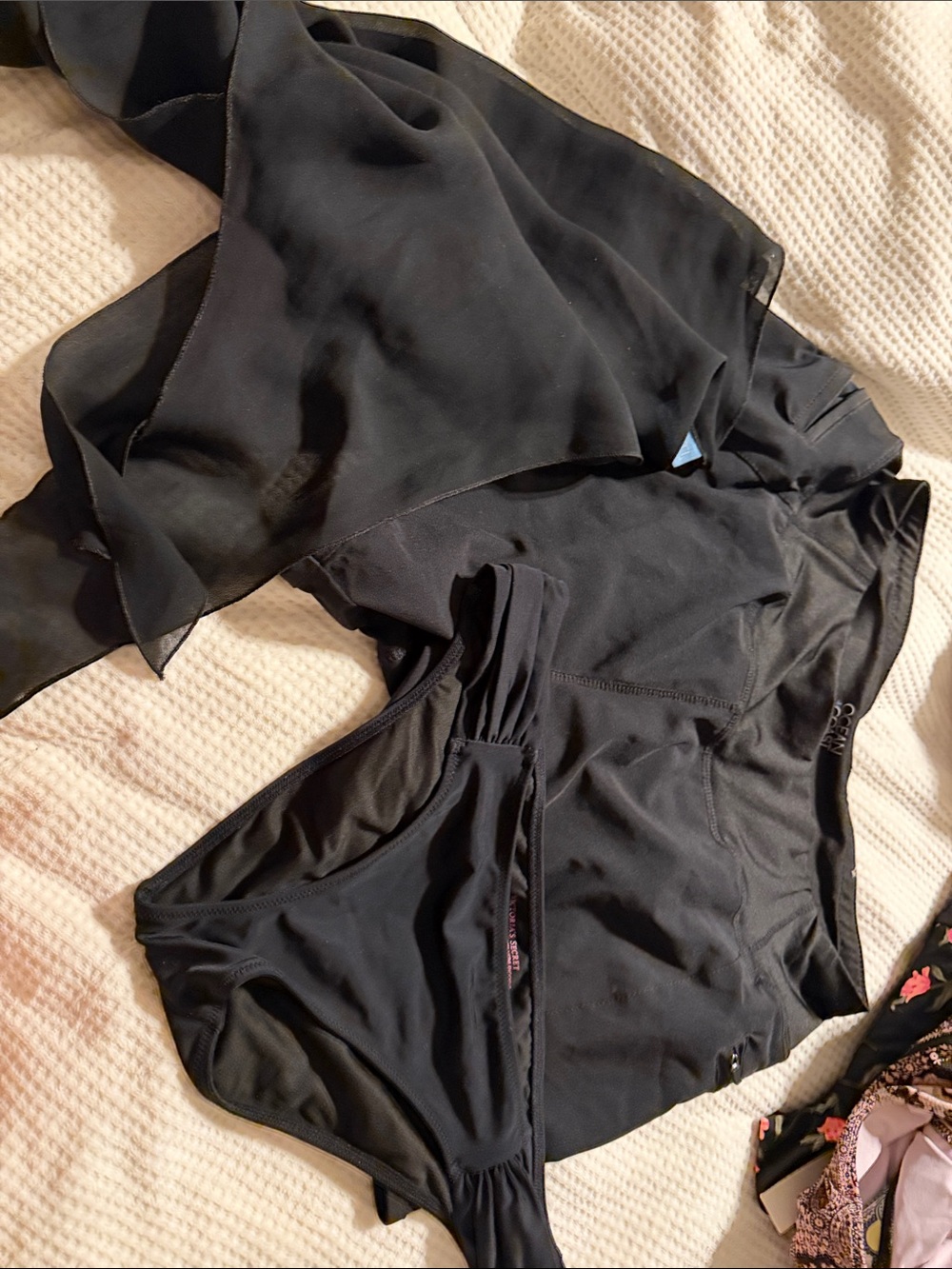 Lot of 3 swim shorts, bikini bottoms, and a black cover-up